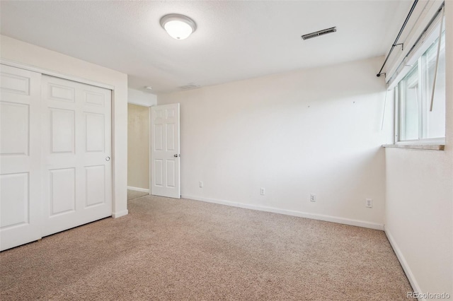 4231 W Ponds Cir, Littleton, CO 80123 - unfurnished bedroom featuring carpet and a closet