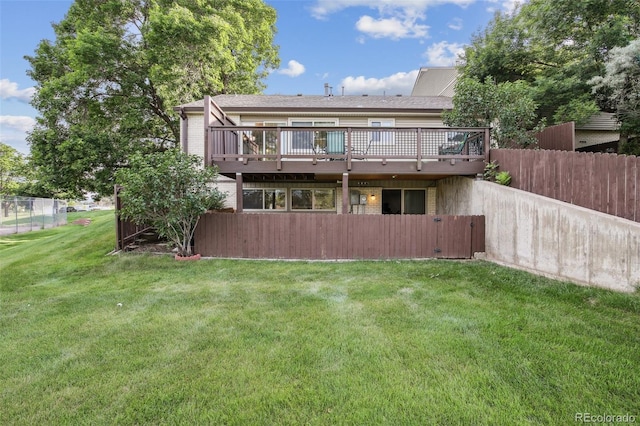 4231 W Ponds Cir, Littleton, CO 80123 - rear view of property featuring a wooden deck