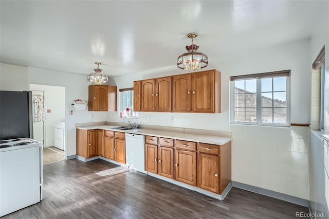 5041 W Nevada Pl, Denver, CO 80219 - kitchen with white appliances, a chandelier, washer / clothes dryer, and dark wood-style floors
