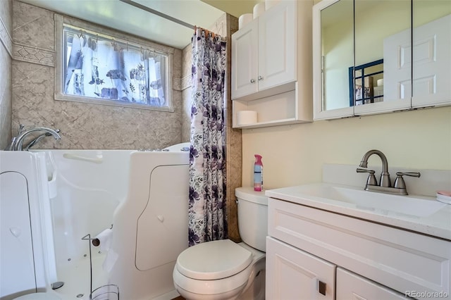 5041 W Nevada Pl, Denver, CO 80219 - full bath featuring a tub and vanity
