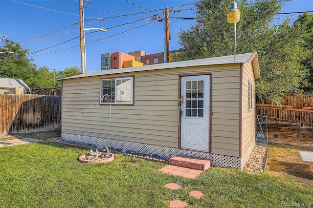 5041 W Nevada Pl, Denver, CO 80219 - view of outdoor structure featuring a fenced backyard