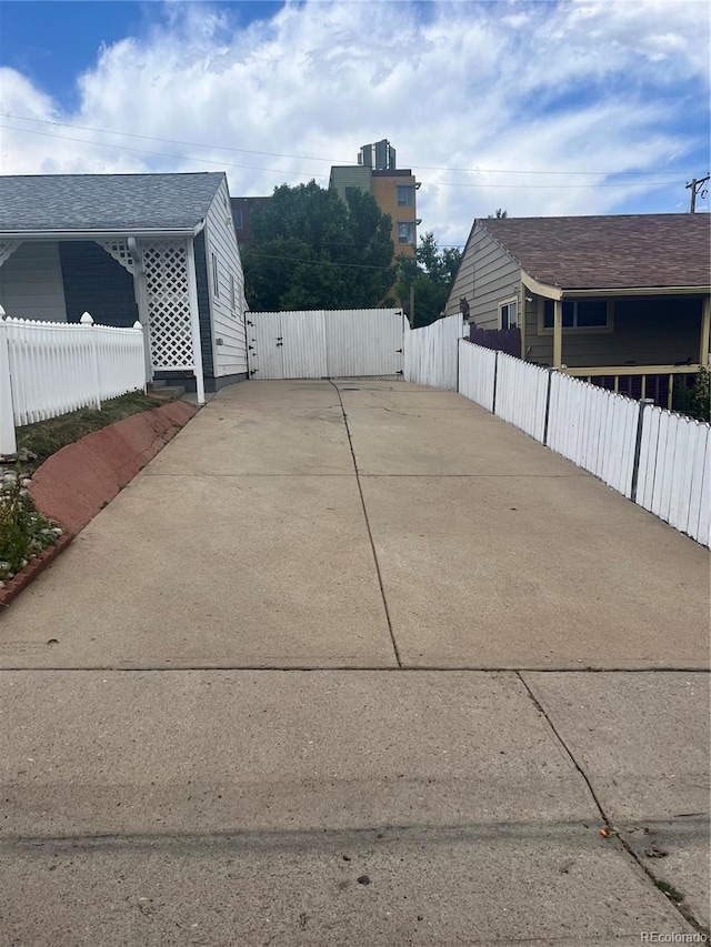 5041 W Nevada Pl, Denver, CO 80219 - view of patio with a gate and driveway