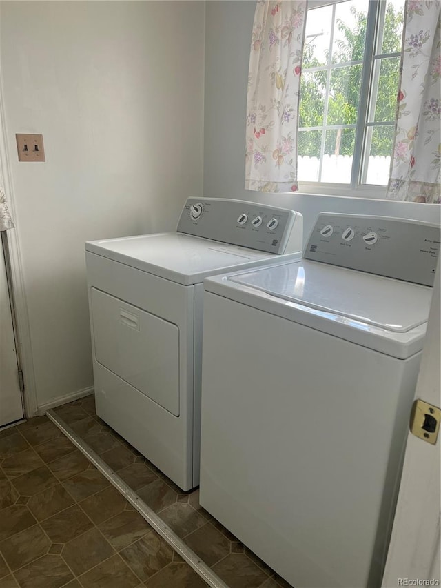 5041 W Nevada Pl, Denver, CO 80219 - washroom featuring washing machine and clothes dryer