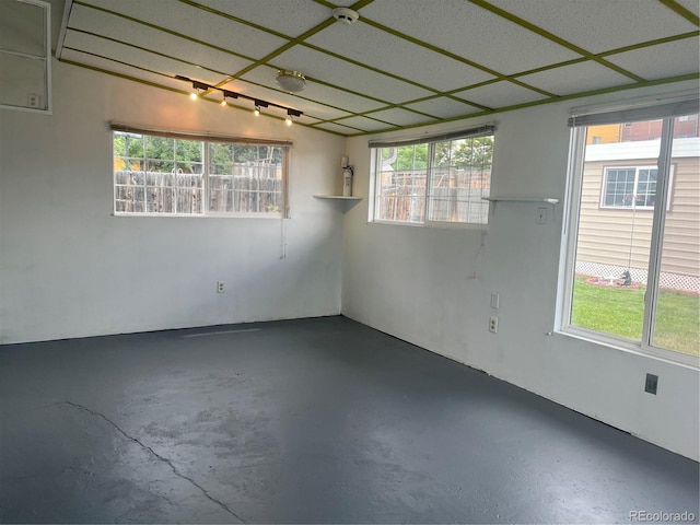5041 W Nevada Pl, Denver, CO 80219 - spare room with a smoke detector and concrete flooring
