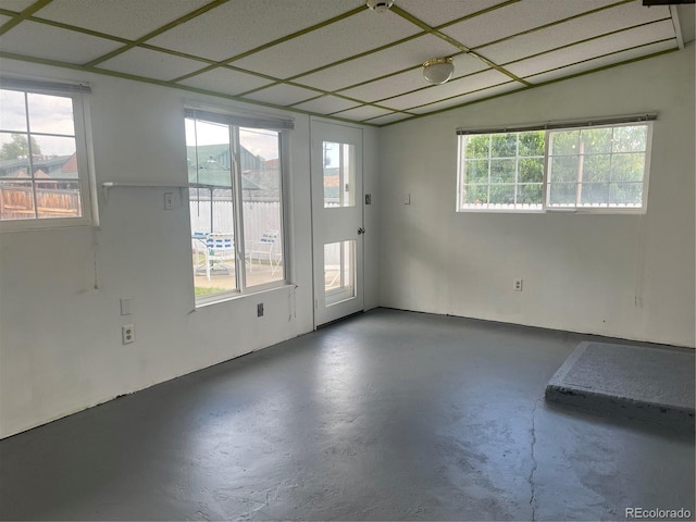 5041 W Nevada Pl, Denver, CO 80219 - empty room featuring concrete floors and plenty of natural light