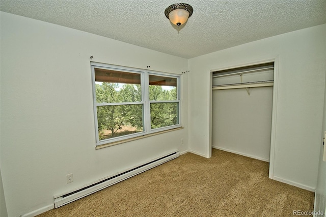 unfurnished bedroom featuring a textured ceiling, a closet, light carpet, and a baseboard radiator