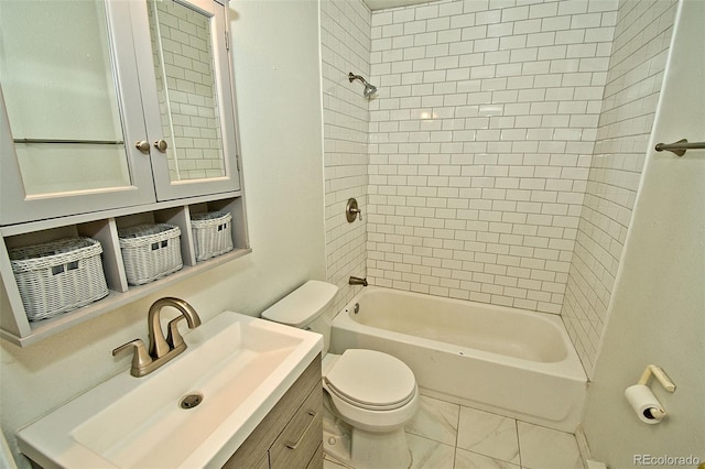 full bathroom with tiled shower / bath combo, toilet, and vanity