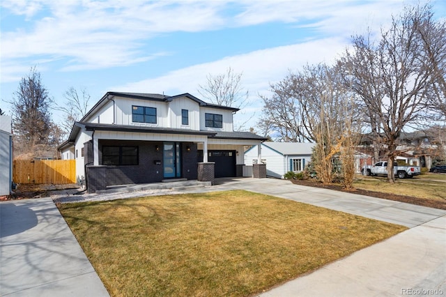 modern inspired farmhouse with fence, brick siding, concrete driveway, a front lawn, and board and batten siding