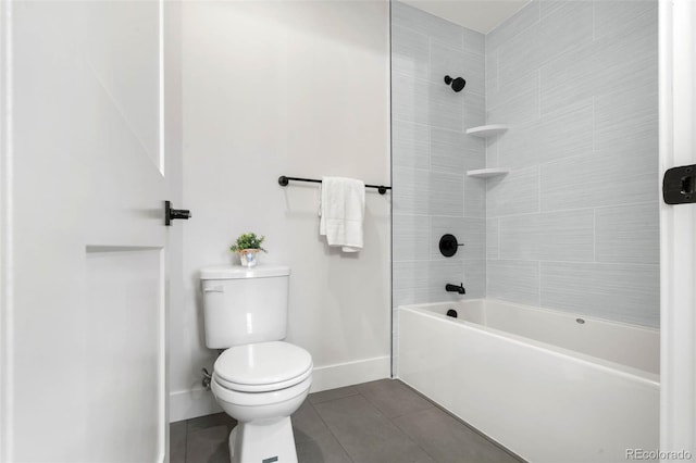 full bath featuring tile patterned flooring, toilet, shower / tub combination, and baseboards