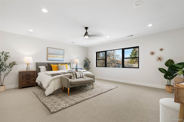 bedroom featuring recessed lighting, baseboards, visible vents, and light colored carpet