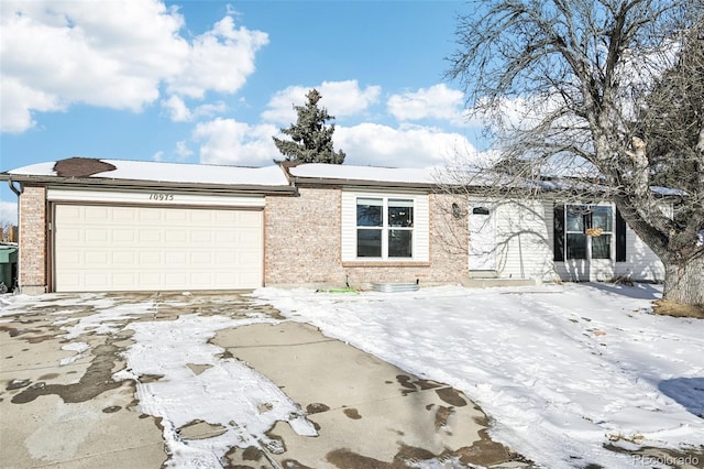 single story home featuring a garage