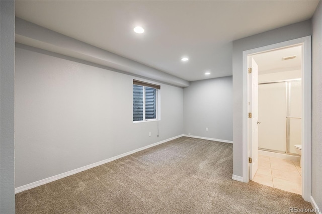 interior space featuring light carpet, light tile patterned floors, visible vents, baseboards, and recessed lighting