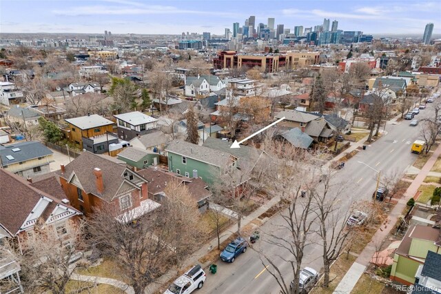 birds eye view of property with a city view