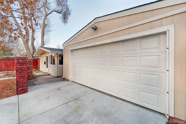 garage featuring fence