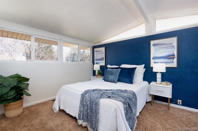 bedroom with vaulted ceiling with beams, multiple windows, baseboards, and carpet flooring