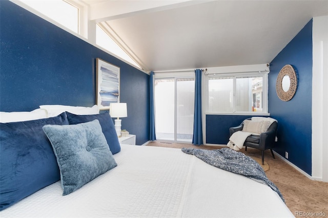 carpeted bedroom with access to outside, vaulted ceiling, and baseboards