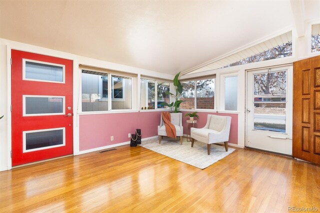 2370 S Meade St, Denver, CO 80219 - foyer with light wood-style floors, vaulted ceiling, and baseboards