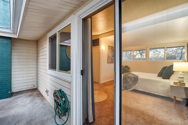 2370 S Meade St, Denver, CO 80219 - bedroom with carpet and wooden walls