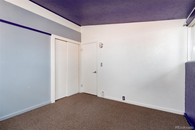 2370 S Meade St, Denver, CO 80219 - carpeted empty room featuring baseboards