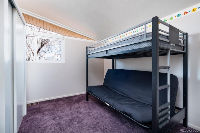 2370 S Meade St, Denver, CO 80219 - carpeted bedroom featuring lofted ceiling and baseboards