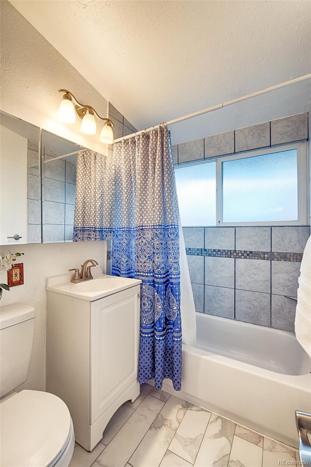 2370 S Meade St, Denver, CO 80219 - full bathroom featuring marble look tiles, toilet, shower / bathtub combination with curtain, a textured ceiling, and vanity