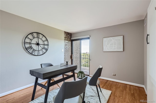 office area with hardwood / wood-style flooring