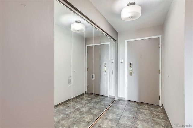 foyer with baseboards