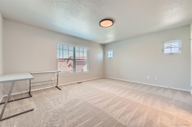 1389 S Quintero Way, Aurora, CO 80017 - carpeted spare room with a textured ceiling