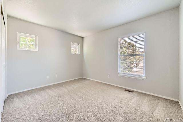 1389 S Quintero Way, Aurora, CO 80017 - carpeted empty room with healthy amount of natural light