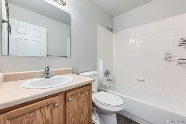 1389 S Quintero Way, Aurora, CO 80017 - full bath featuring vanity, shower / bath combination, and wood finished floors