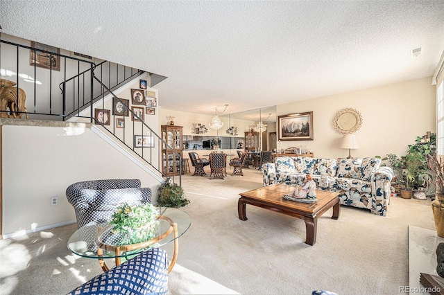 living room with carpet flooring and a textured ceiling