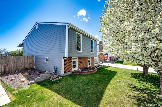 862 Centennial Way, Bennett, CO 80102 - view of property exterior featuring brick siding