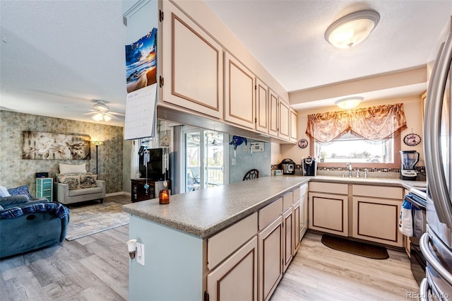 862 Centennial Way, Bennett, CO 80102 - kitchen featuring open floor plan, light wood-type flooring, a sink, ceiling fan, and a textured ceiling