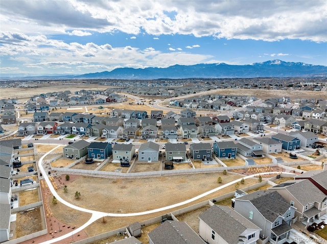 bird's eye view with a residential view and a mountain view