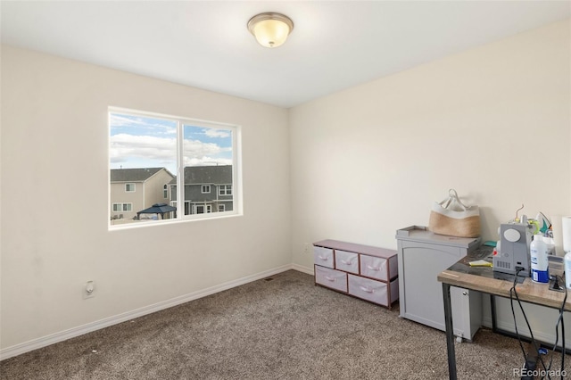 office space featuring carpet and baseboards