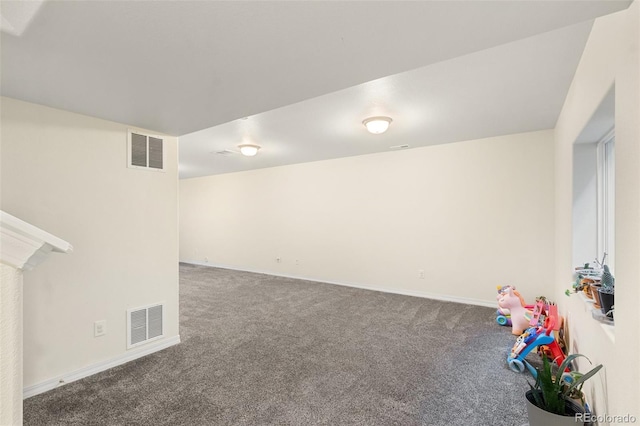 game room featuring carpet floors, visible vents, and baseboards