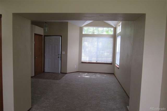 4812 S Bahama Way, Aurora, CO 80015 - carpeted spare room with healthy amount of natural light, lofted ceiling, and baseboards