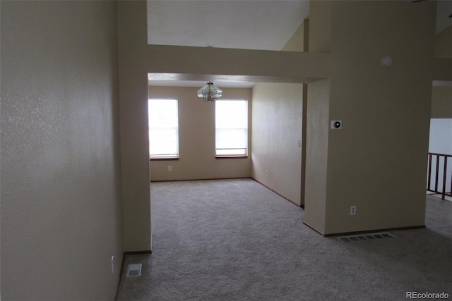 4812 S Bahama Way, Aurora, CO 80015 - unfurnished room with carpet floors, a chandelier, and baseboards