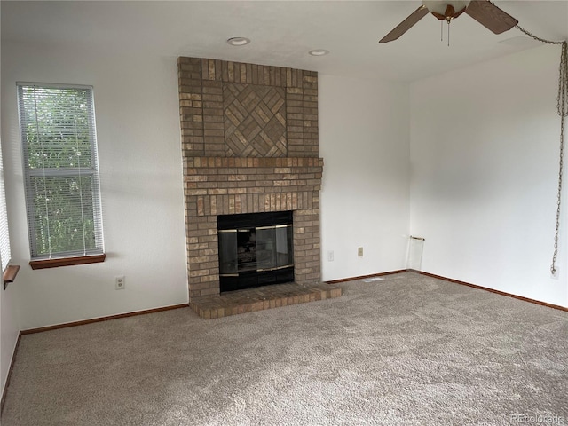 4812 S Bahama Way, Aurora, CO 80015 - unfurnished living room featuring carpet, ceiling fan, a brick fireplace, baseboards, and recessed lighting