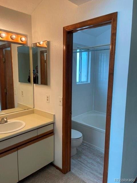 4812 S Bahama Way, Aurora, CO 80015 - bathroom featuring vanity, toilet, and shower / bath combination