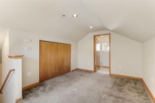 1104 Miner St, Idaho Springs, CO 80452 - additional living space featuring vaulted ceiling, light colored carpet, baseboards, and recessed lighting