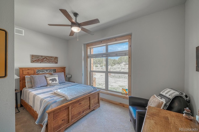 11398 County Road 302, Buena Vista, CO 81211 - bedroom with light carpet and a ceiling fan