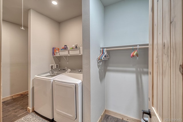 11398 County Road 302, Buena Vista, CO 81211 - laundry area featuring washer and dryer, wood finished floors, and attic access