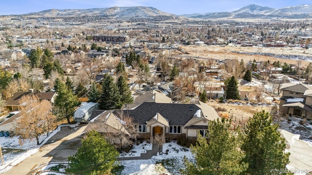 birds eye view of property featuring a mountain view