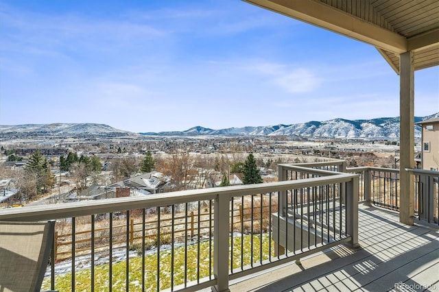 wooden terrace with a mountain view