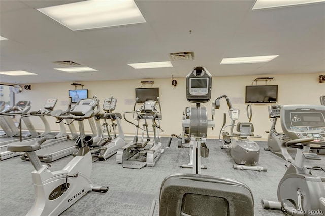 exercise room featuring visible vents