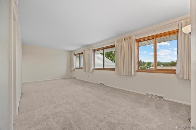 7483 W Cedar Cir, Lakewood, CO 80226 - unfurnished room with baseboards and carpet flooring
