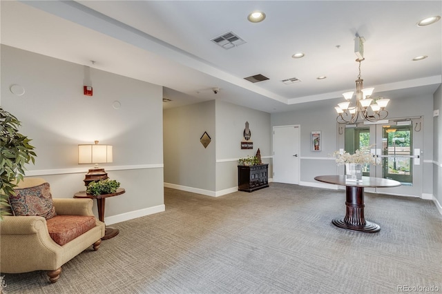 interior space with recessed lighting, carpet flooring, visible vents, and baseboards