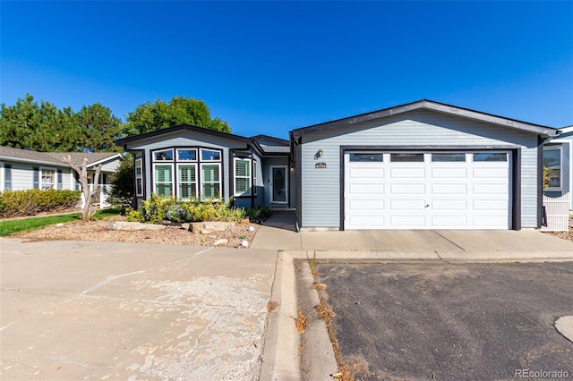 ranch-style home with a garage