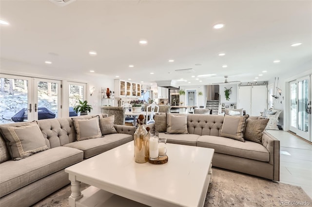 living room featuring recessed lighting and french doors